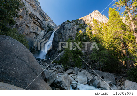 Sunny view of the Lower Yosemite Falls in Yosemite National Park Sunny view of the Lower Yosemite Falls in Yosemite National Park 119308073