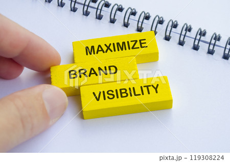 Maximize Brand Visibility text on yellow wooden blocks. Branding visibility concept. Maximize Brand Visibility text on yellow wooden blocks. Branding visibility concept. 119308224