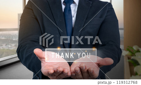 Businessman showing word a thank you on his hands. Concept of gratitude and appreciation Businessman showing word a thank you on his hands. Concept of gratitude and appreciation 119312768