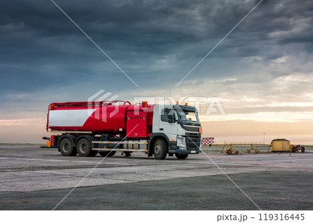 Aircraft fueler on the cloudy morning airport apron Aircraft fueler on the cloudy morning airport apron 119316445