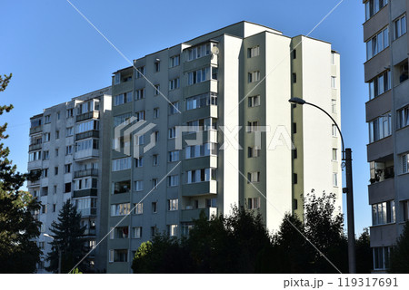 Typical facade of concrete panel building. Post Soviet flat of blocks 119317691