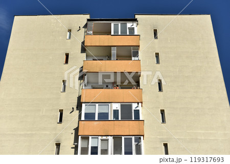 Typical facade of concrete panel building. Post Soviet flat of blocks 119317693