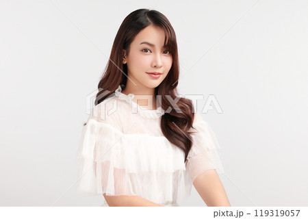 Beautiful young asian woman with clean fresh skin on white background, Face care, Facial treatment, Cosmetology, beauty and spa, Asian women portrait. Beautiful young asian woman with clean fresh skin on white background, Face care, Facial treatment, Cosmetology, beauty and spa, Asian women portrait. 119319057