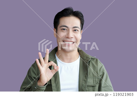 Smiling Man Showing Okay Gesture Smiling Man Showing Okay Gesture 119321903