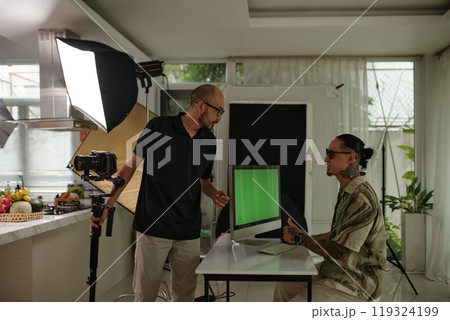 Cameraman Setting Equipment Before Shoot Cameraman Setting Equipment Before Shoot 119324199