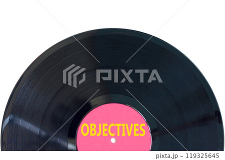 Objectives symbol. Concept word Objectives on beautiful black purple vinyl disk. Beautiful white background. Business objectives concept. Copy space. 119325645