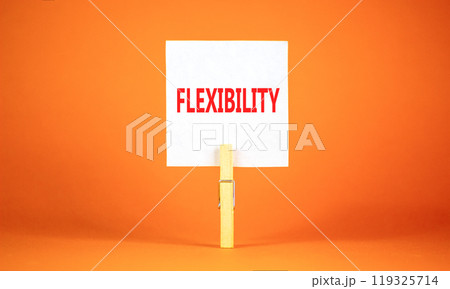 Flexibility symbol. Concept word Flexibility on beautiful white paper on clothespin. Beautiful orange background. Business flexibility concept. Copy space. 119325714