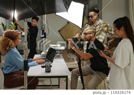 Cameraman Shooting Business Theme In Studio Cameraman Shooting Business Theme In Studio 119326174
