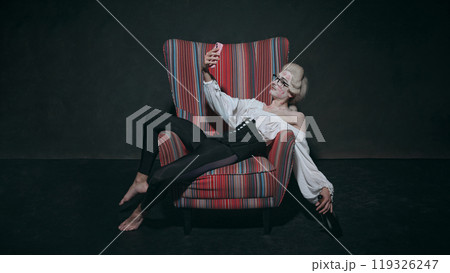 playful portrait of selfie moment from historical figure with kiss marks. Comparisons of eras - vintage vs modern. playful portrait of selfie moment from historical figure with kiss marks. Comparisons of eras - vintage vs modern. 119326247