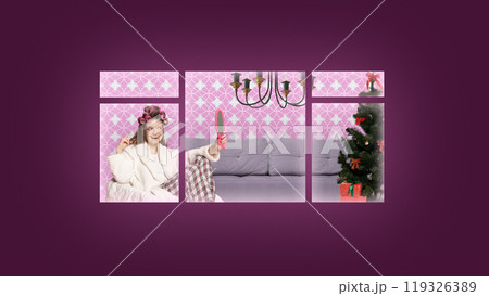 Contemporary art collage. Cheerful girl in curlers looks in mirror, celebrating cozy morning in front of Christmas tree, framed through window. 119326389