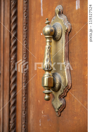 Beautiful Metal Handle On Wooden Door 119327524