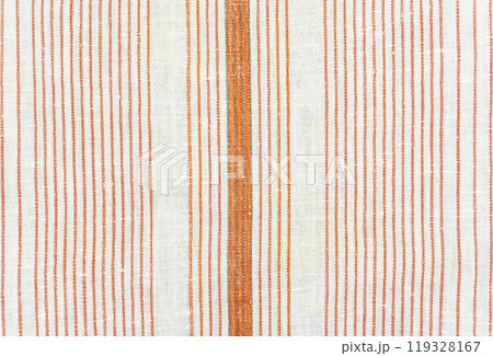 Texture of cotton fabric with red stripes. Texture of cotton fabric with vertical red stripes 119328167