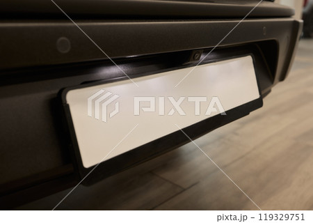 Detailed Close-up of a Vehicle Bumper Component Featuring Convenient Storage Space 119329751