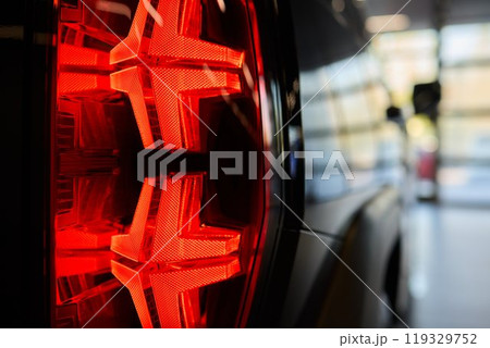 Closeup of a cars automotive tail brake light 119329752