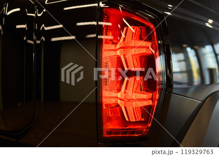 Closeup of a cars automotive tail brake light 119329763