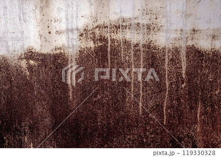Textured metal surface featuring unique rust patterns and drips from top to bottom. Copy space. 119330328