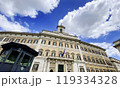 Facade of Palazzo Montecitorio in Rome with Italian and European flags 119334328