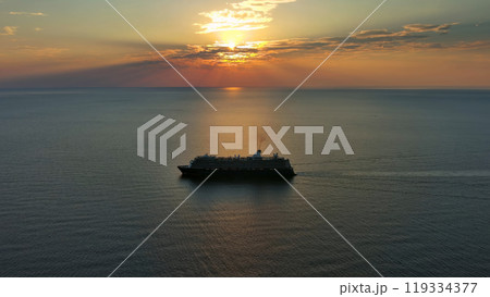 Cruise ship during sunset 119334377