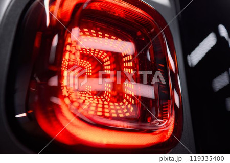 Closeup of a cars automotive tail brake light Closeup of a cars automotive tail brake light 119335400
