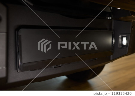 Detailed Close-up of a Vehicle Bumper Component Featuring Convenient Storage Space Detailed Close-up of a Vehicle Bumper Component Featuring Convenient Storage Space 119335420
