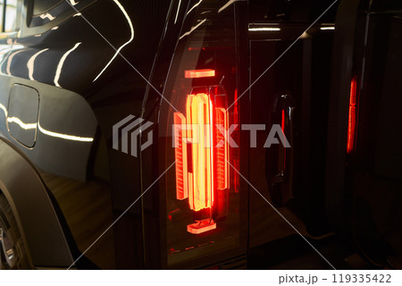 Closeup of a cars automotive tail brake light Closeup of a cars automotive tail brake light 119335422