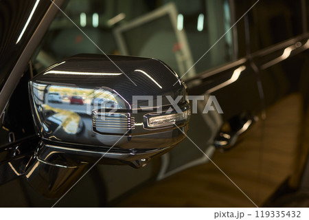 Introducing the modern car side mirror with integrated tech for improved functionality and style 119335432