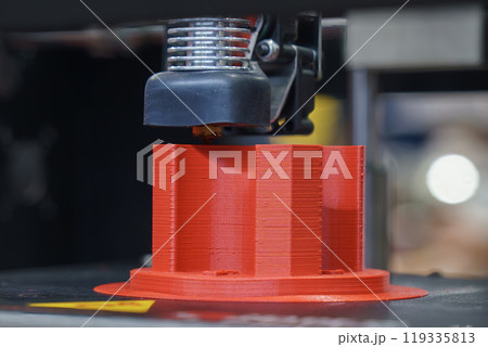 Close up scene the additive manufacturing by 3D printer machine. Close up scene the additive manufacturing by 3D printer machine. 119335813