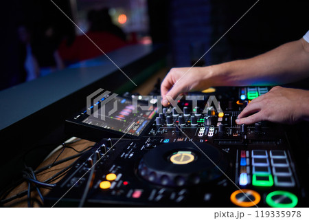 Audio Mixing Console in a Recording Studio with advanced sound production capabilities Audio Mixing Console in a Recording Studio with advanced sound production capabilities 119335978