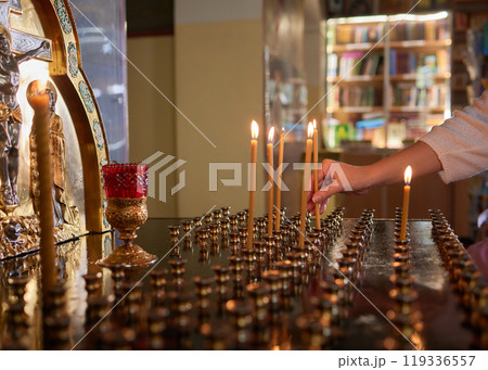 Candle Lighting in a Calm and Peaceful Spiritual Space for Meditation and Reflection 119336557