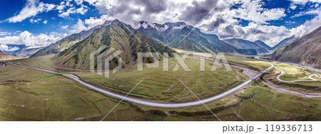 Drone view of the Cross Pass in Georgia, showcasing winding roads and mountainous terrain 119336713