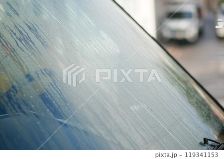 A CloseUp View of a Foggy Windshield on a Rainy Day, Capturing the Atmosphere and Mood A CloseUp View of a Foggy Windshield on a Rainy Day, Capturing the Atmosphere and Mood 119341153