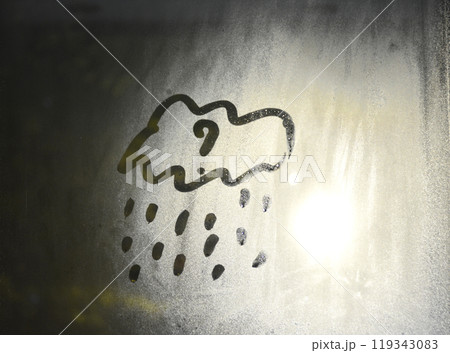 A cloud with raindrops is drawn on a window pane A cloud with raindrops is drawn on a window pane 119343083