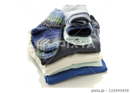 A stack of baby clothes 119343450
