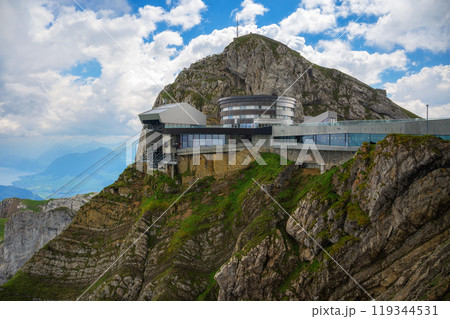 Mount Pilatus in Switzerland with a cable car station and a mountain resort Mount Pilatus in Switzerland with a cable car station and a mountain resort 119344531