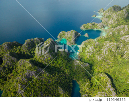 Lagoons and Lake surrounded by splendid limestone rock formation and scenic mountain. Coron, Palawan. Philippines. 119346333