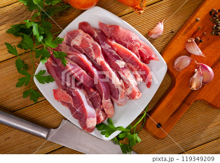 Raw sliced turkey thigh 119349209