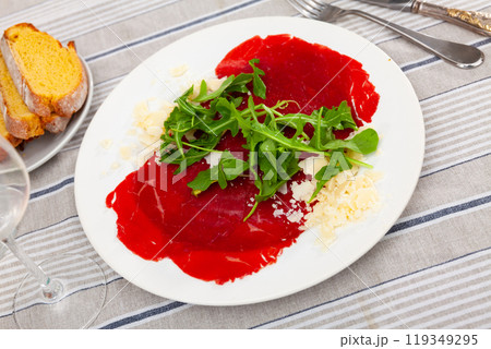 Raw beef meat, carpaccio, served on plate Raw beef meat, carpaccio, served on plate 119349295