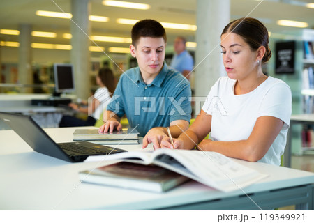 View on young european students studying together View on young european students studying together 119349921