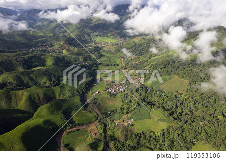 Landscape of Morning Mist with Mountain Layer. mountain ridge and clouds in rural jungle bush forest Landscape of Morning Mist with Mountain Layer. mountain ridge and clouds in rural jungle bush forest 119353106