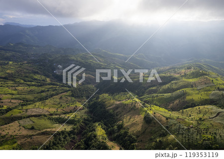 Landscape of Morning Mist with Mountain Layer. mountain ridge and clouds in rural jungle bush forest Landscape of Morning Mist with Mountain Layer. mountain ridge and clouds in rural jungle bush forest 119353119
