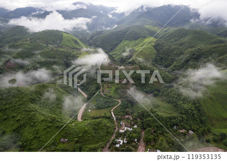 Landscape of Morning Mist with Mountain Layer. mountain ridge and clouds in rural jungle bush forest Landscape of Morning Mist with Mountain Layer. mountain ridge and clouds in rural jungle bush forest 119353135