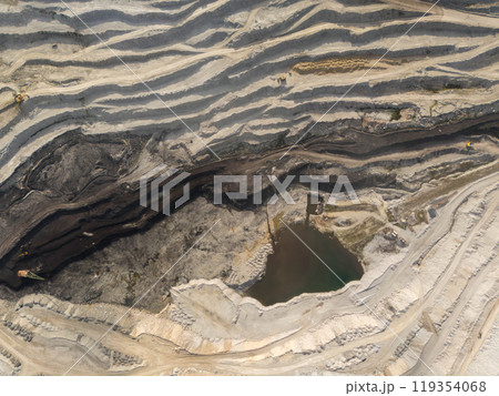The bottom of a coal pit with multi-level roads for trucks 119354068