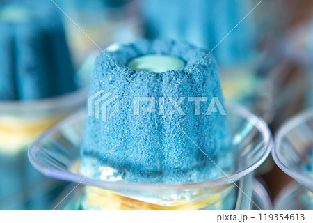 Colorful Blue Dessert Served in Glass Dishes at a Festive Event in the Afternoon Colorful Blue Dessert Served in Glass Dishes at a Festive Event in the Afternoon 119354613