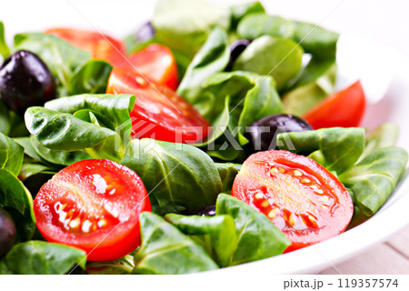 Mixed salad on a plate Mixed salad on a plate 119357574