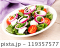 Mixed salad on a plate 119357577