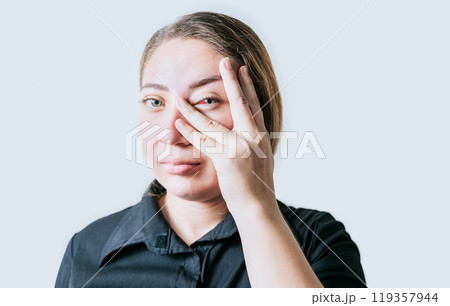 Person with irritated eyes. People with eye pain isolated. woman with conjunctivitis on white background. Close up of girl with eye strain Person with irritated eyes. People with eye pain isolated. woman with conjunctivitis on white background. Close up of girl with eye strain 119357944