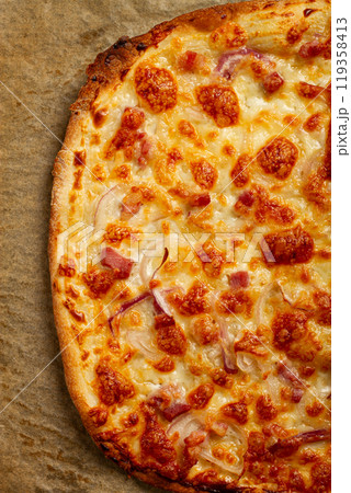 tart flambe, open pie, rectangular pizza, with cheese and red onion, bacon slices, Alsatian dish,  119358413