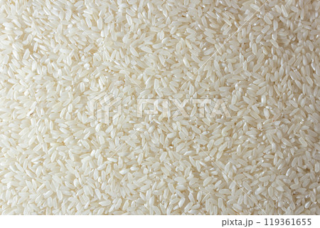 Dry Uncooked White Rice Background Dry Uncooked White Rice Background 119361655