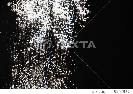 Abstract black and white background of pouring flour, space for text Abstract black and white background of pouring flour, space for text 119362927