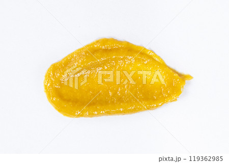 Smear of mustard sauce on white background isolate, creativity in cooking, macro texture 119362985